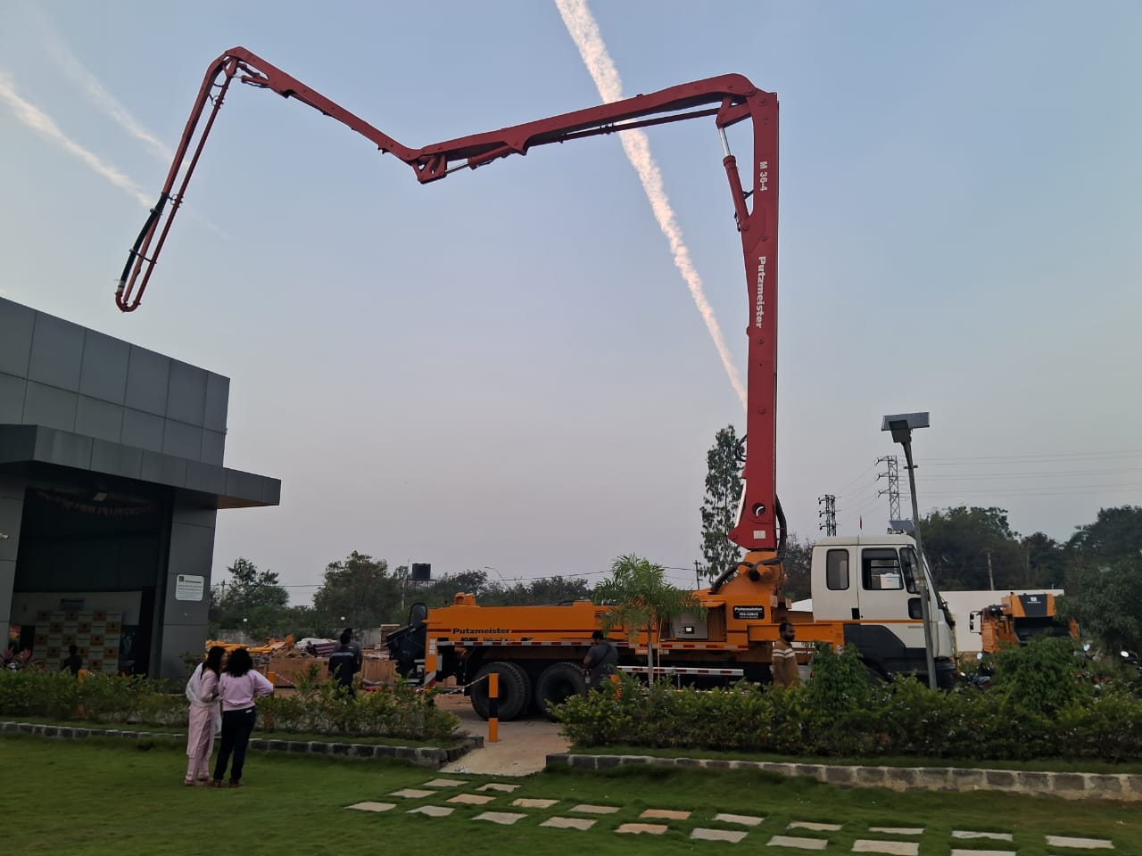 Concrete pump truck at site